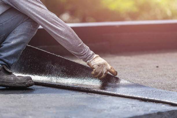 Professional Emergency Waterproofing technician working in Aston, PA